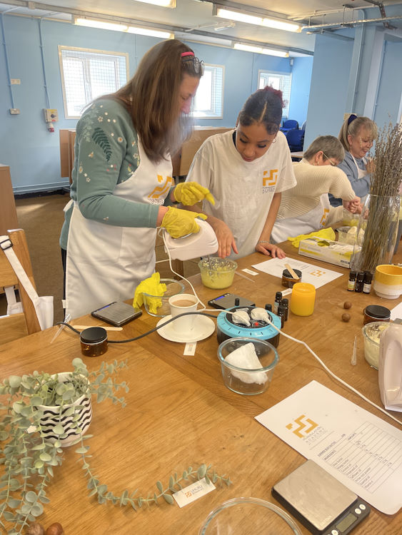 Collaborating on a cosmetic product development course.