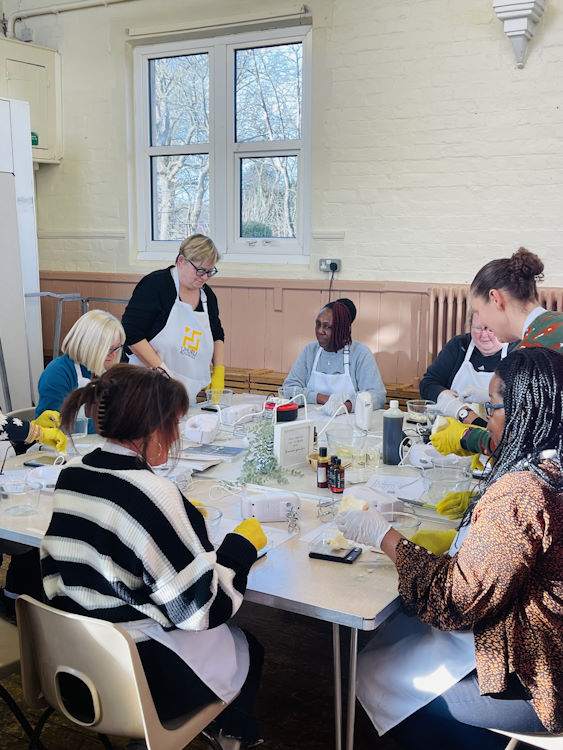 A group learning about cosmetic product development